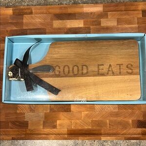 Paddle board with spreader